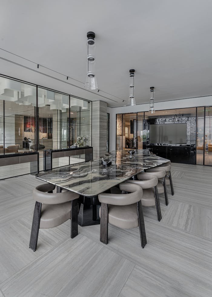 The Art of Drawing Readers In: Your attractive post title goes here Sleek modern office with glass walls, marble table, and stylish lighting. Ideal for corporate settings.